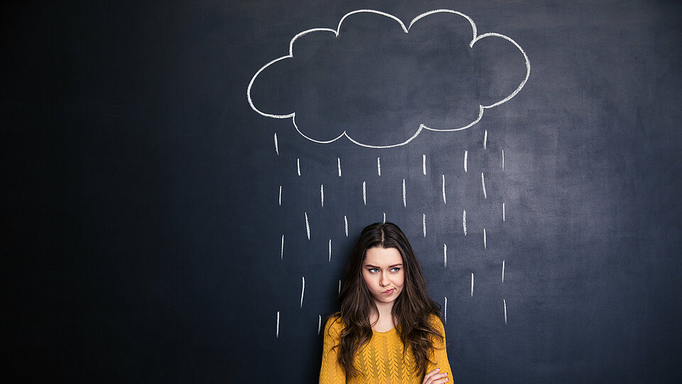 Frau im Regen